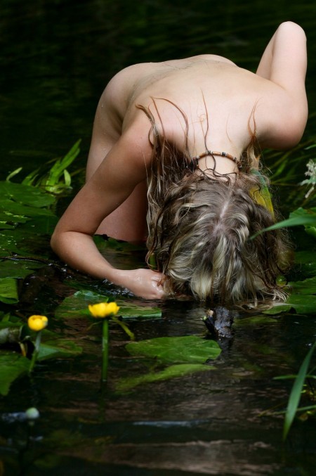 Blonde Valentina is A little mermaid in the forest pond