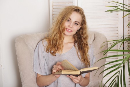 A pretty girl with the book  blonde